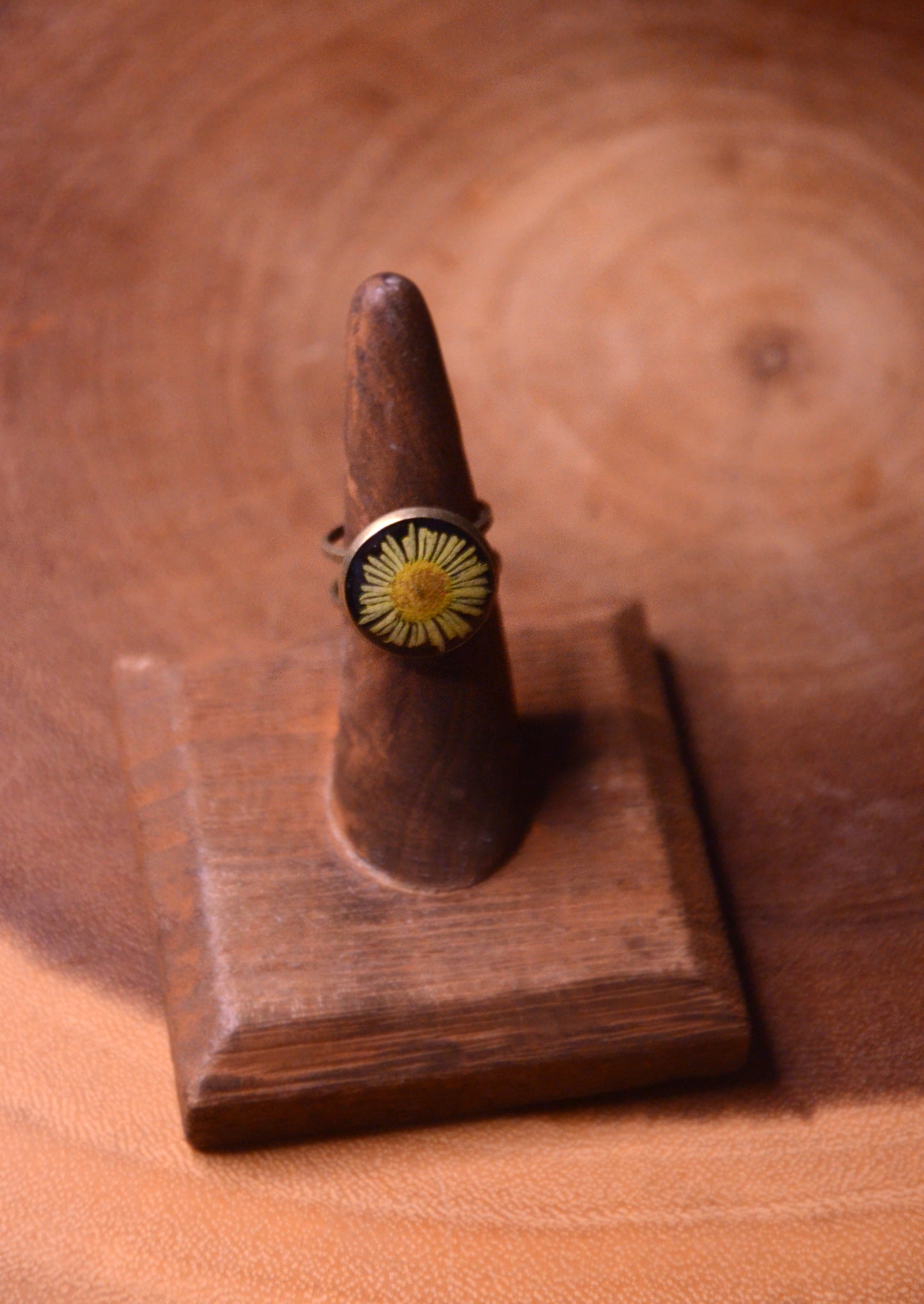 Antique Bronze Adjustable Ring with Black Background and Yellow Daisy