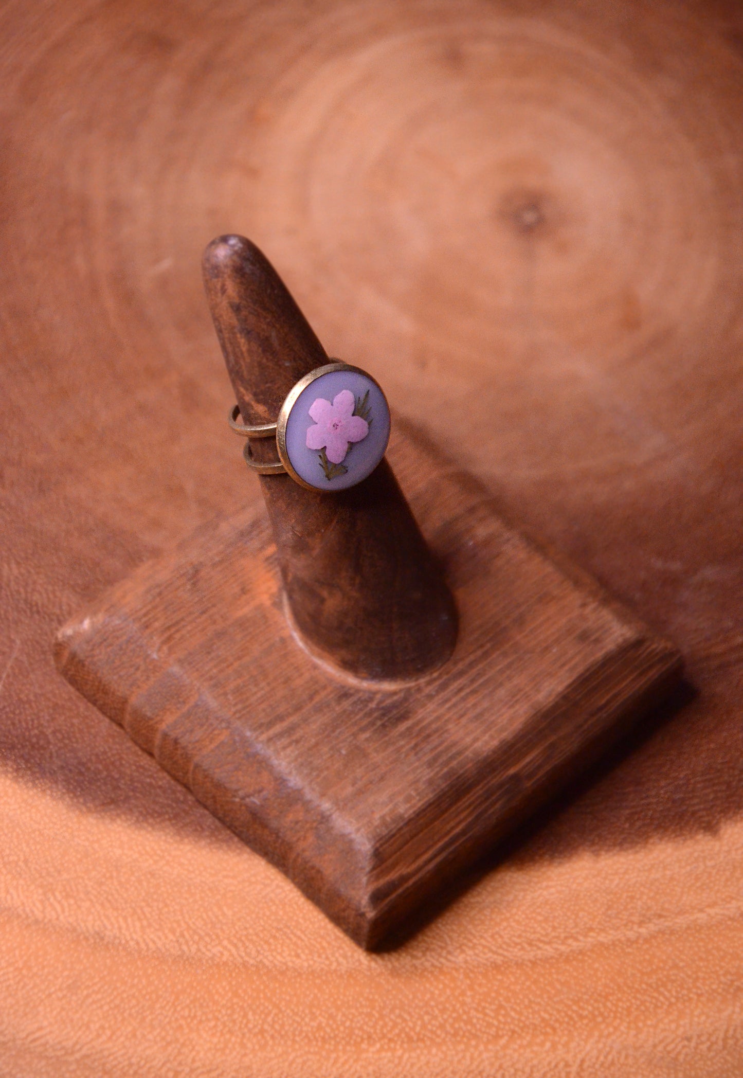 Antique Bronze Adjustable Ring with White Background and Pink Forget Me Nots with Fern Tips